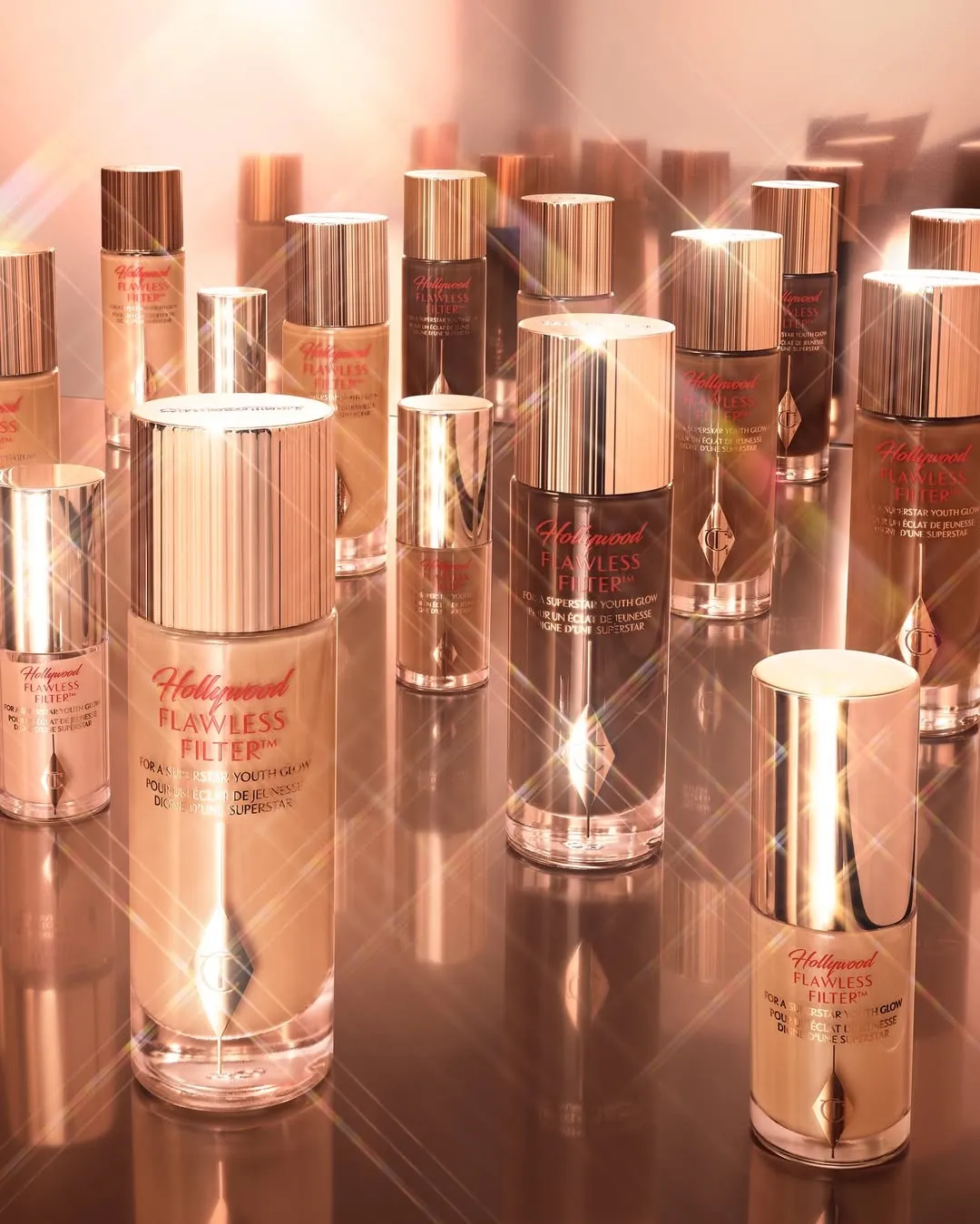 Multiple bottles of Charlotte Tilbury Hollywood Flawless Filter