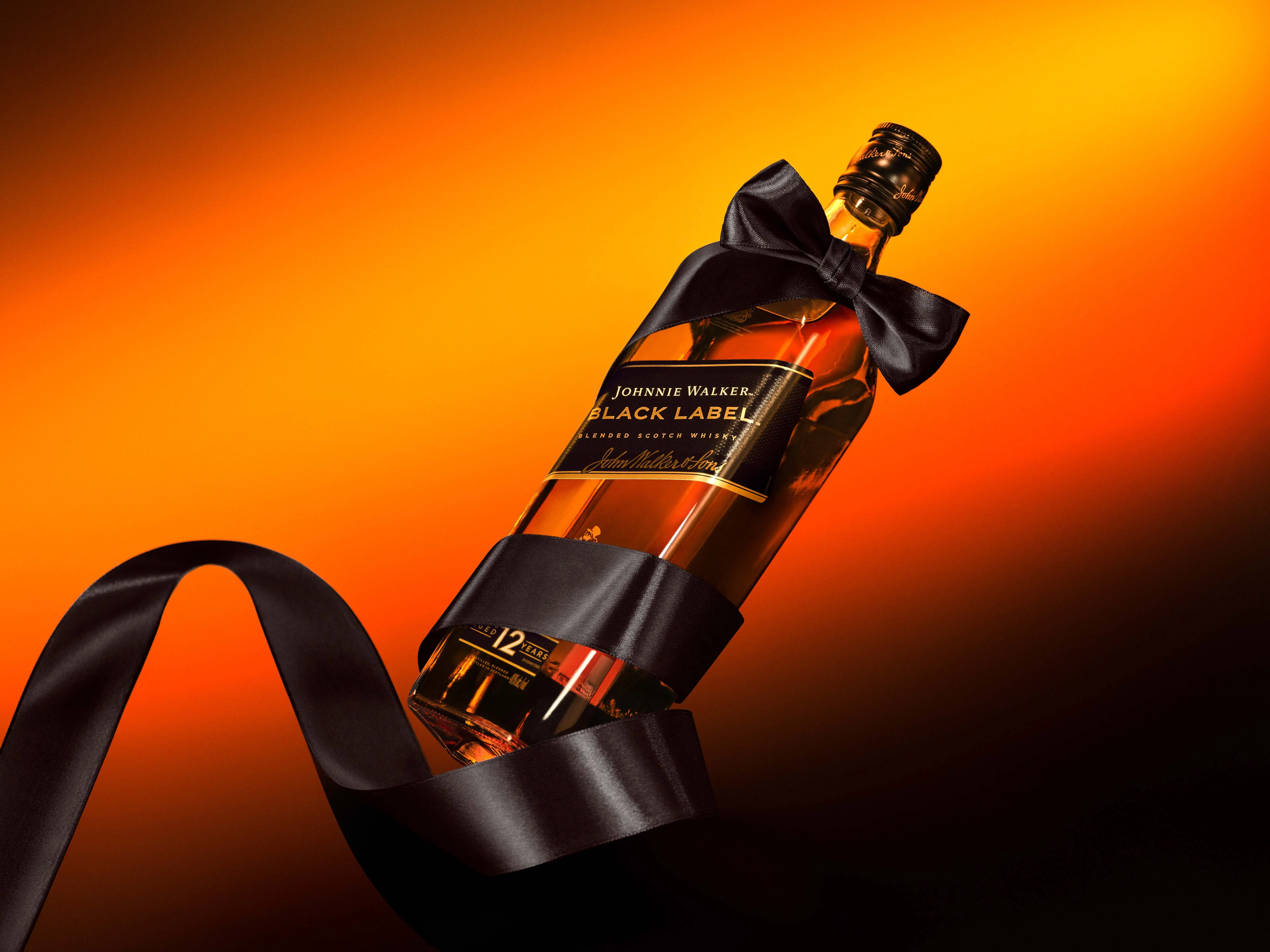A bottle of Johnnie Walker to show how scothc cockatils in India and modern whisky drinking culture is here in India