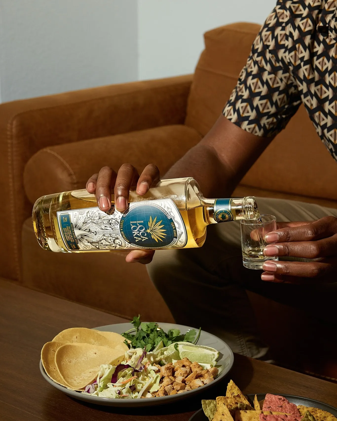 A picture of Loca Loka tequila being served neat during a meal to show the change in the spirits industry India to include agave spirits in India and tequila in India