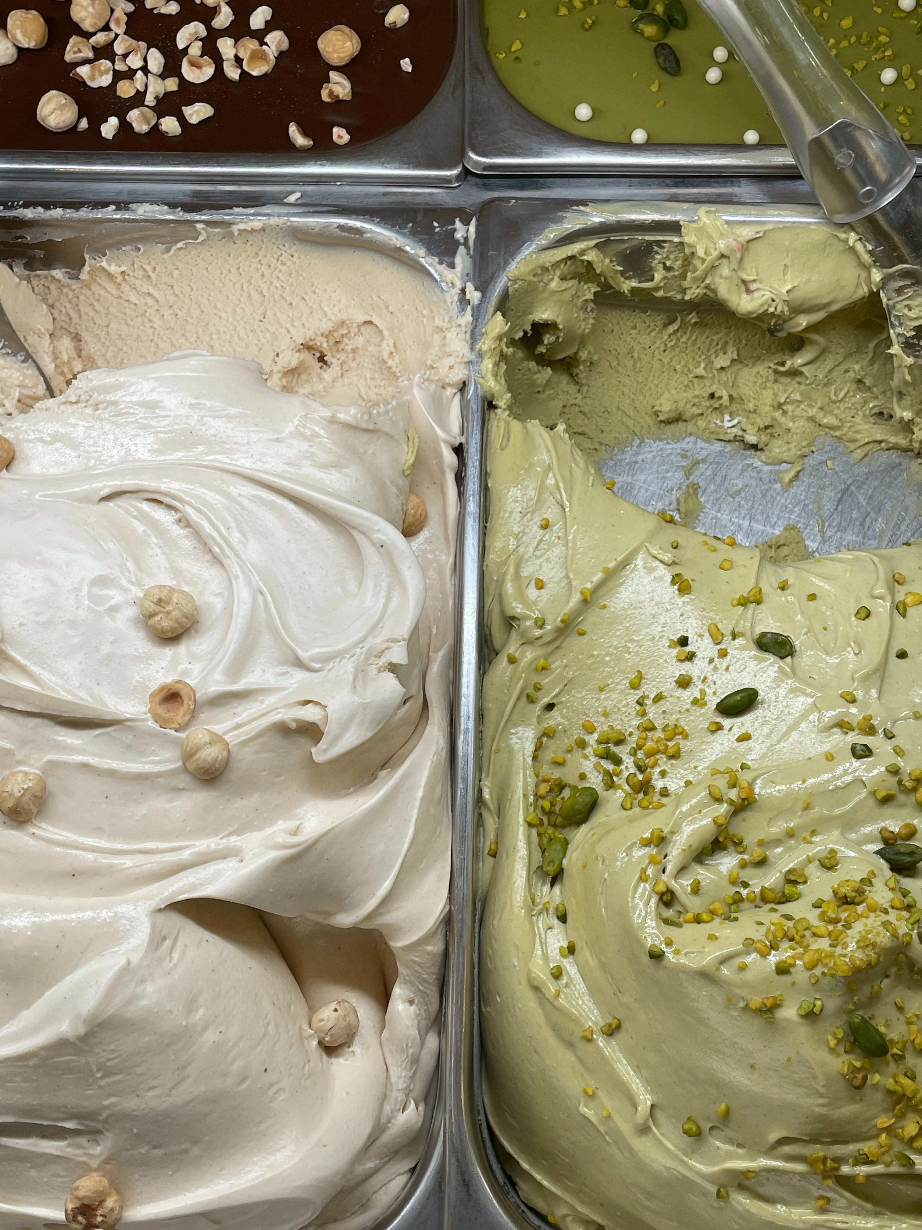 A picture of gelatos to depict how the dessert aspect of Italian cuisine in India, though Italian cuisine has many more desserts