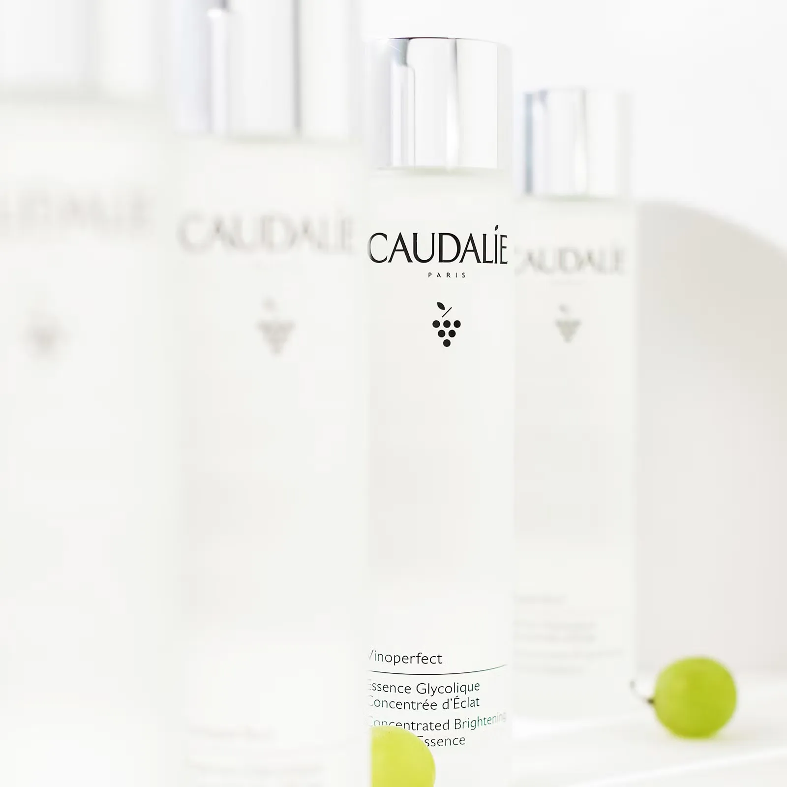 A few bottles of Caudalie glycolic acid treatment placed next to each other
