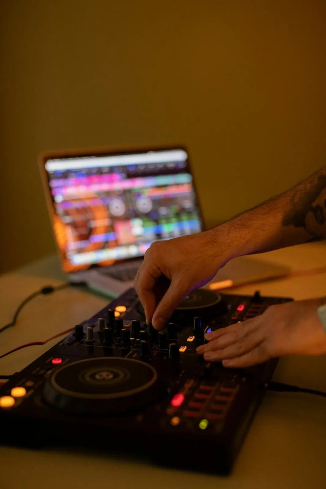 A picture of a person mixing music to show how cost of releasing music in India has been impacted by technology in the music industry in India which impacts the business of musicians in India