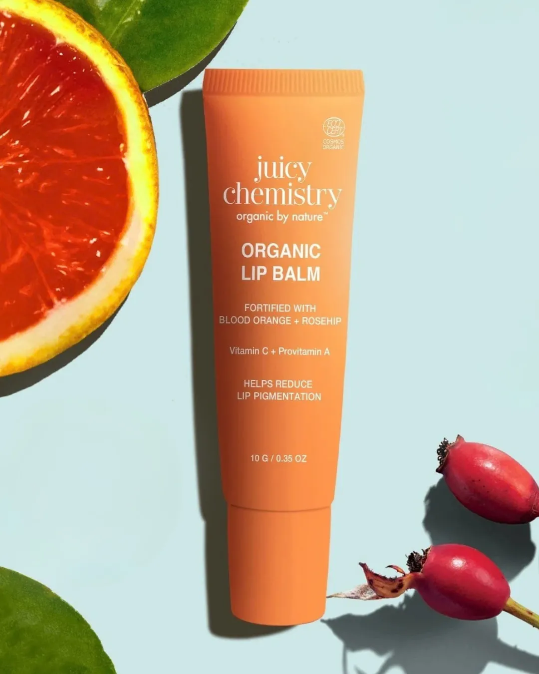 An orange tube of juicy chemistry best organic lip balm in india