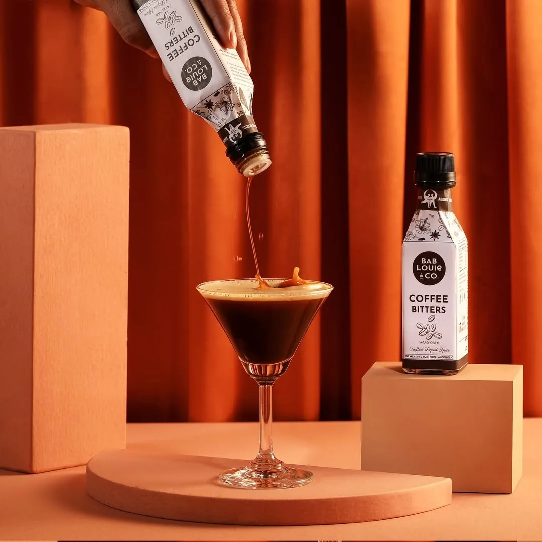 A picture of Bab Louie & Co. bitters in India which are luxury cocktail ingredients and work as a crucial home bar ingredients India as Indian cocktail culture evolves and embraces mixology trends India