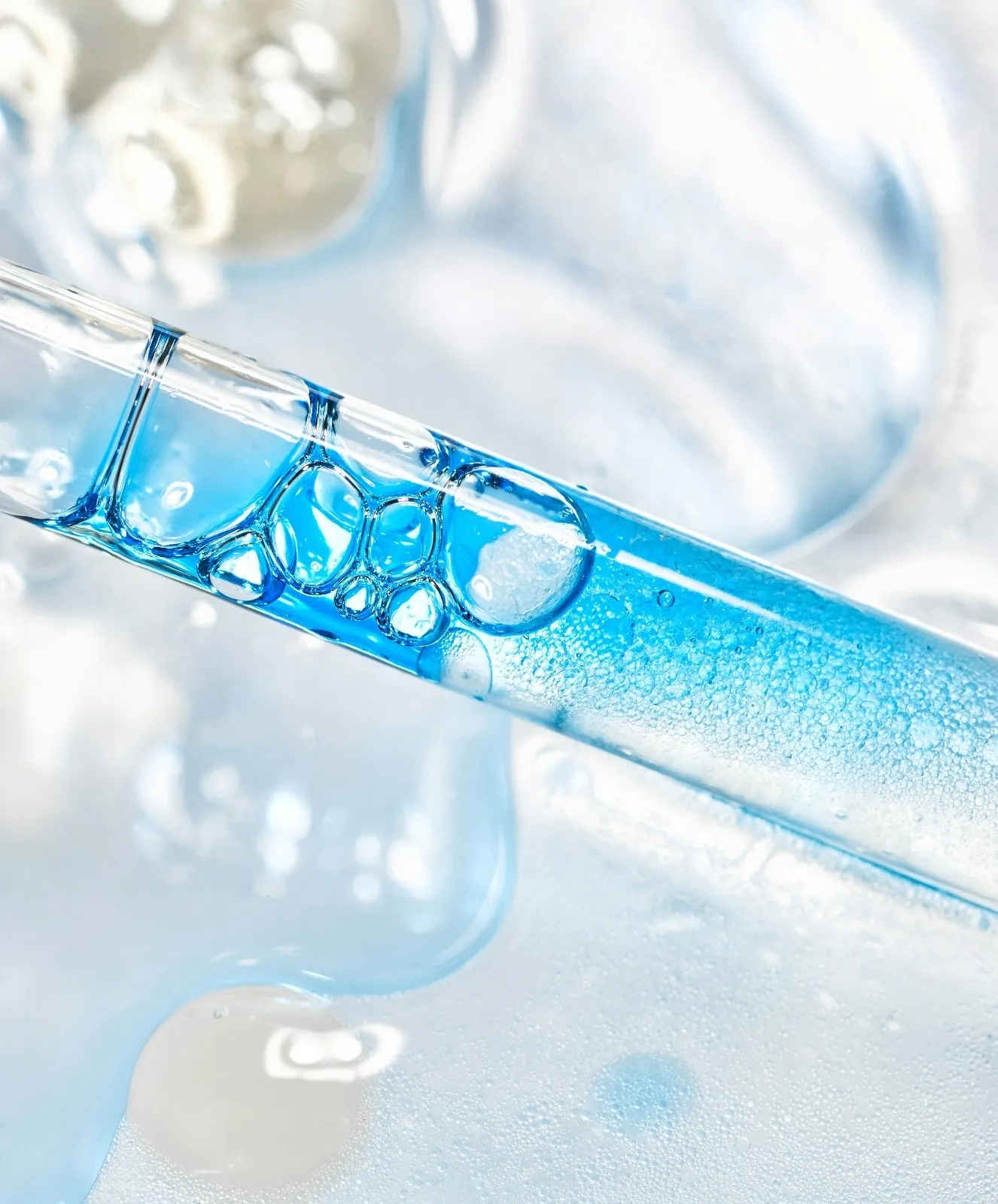 A picture of a pipette with blue serum