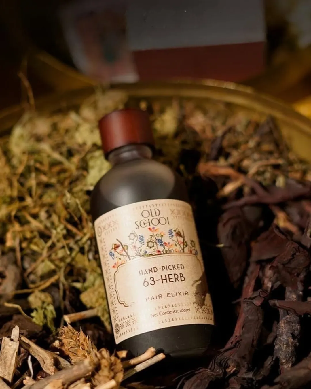 A bottle of the best hair oil with 63 herbs