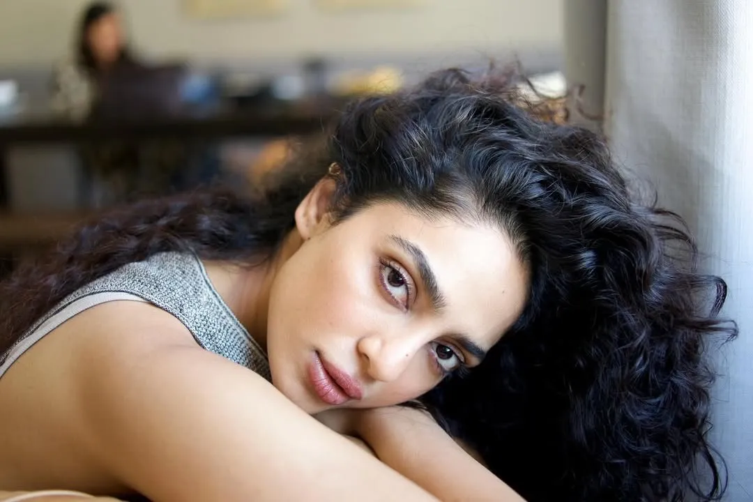 An image of Sobhita Dhulipala looking into the camera