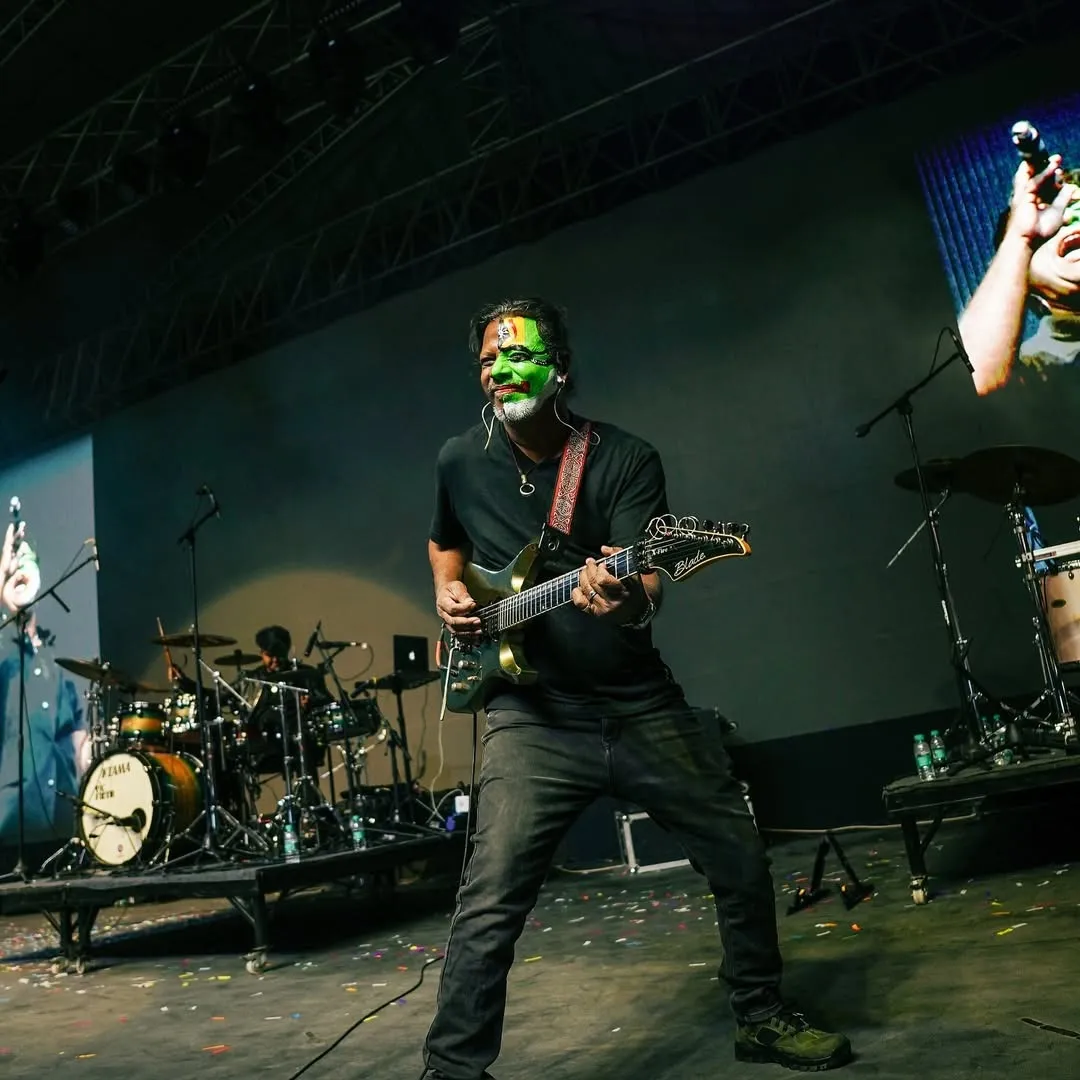 A picture of a person with a painted face--a member of Motherjane, one of the top indian music bands which became one of the indian best music bands in the progressive rock scene as well as indian fusion music bands&ZeroWidthSpace;