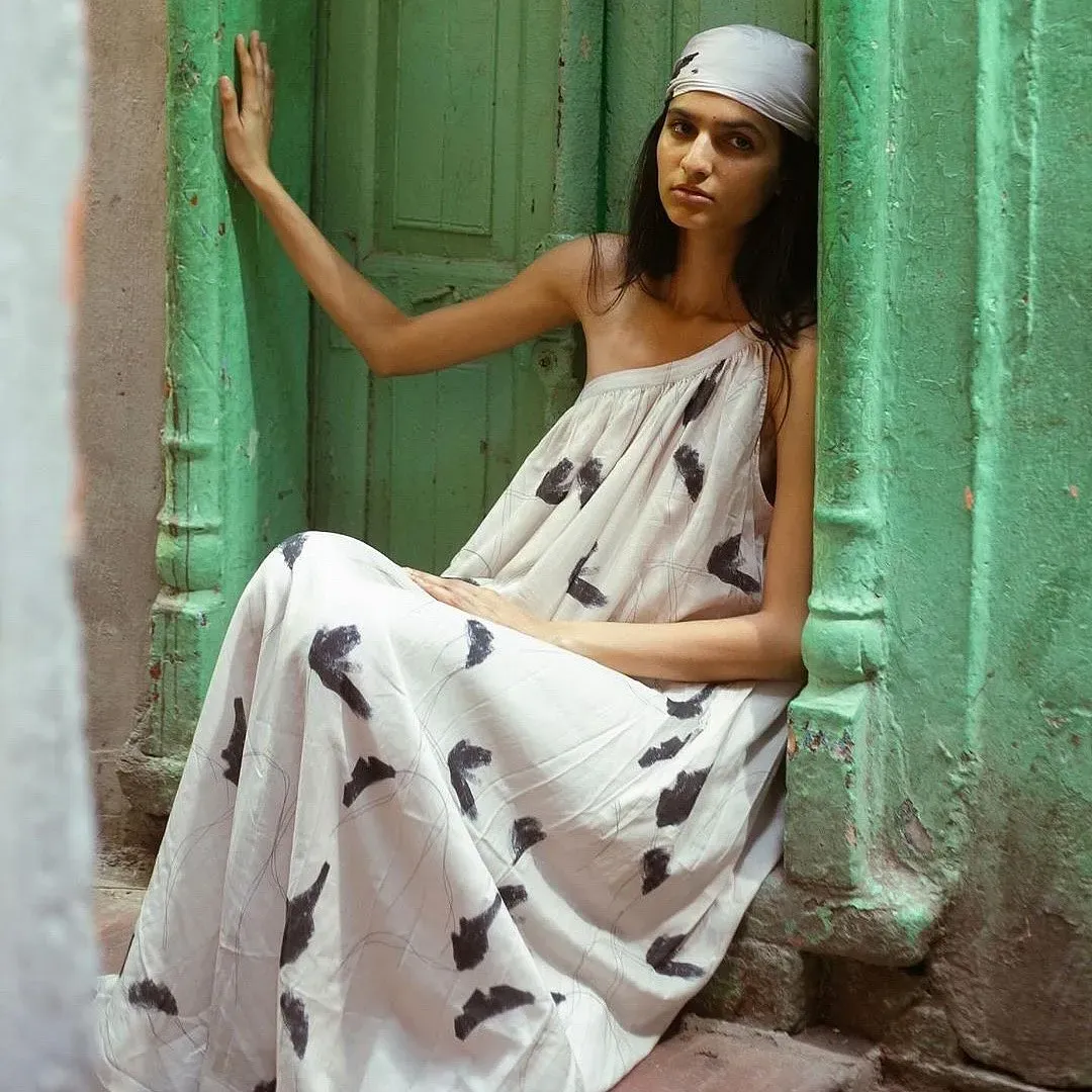 Model wearing Doodlage upcycled floral dress in sustainable fashion photoshoot