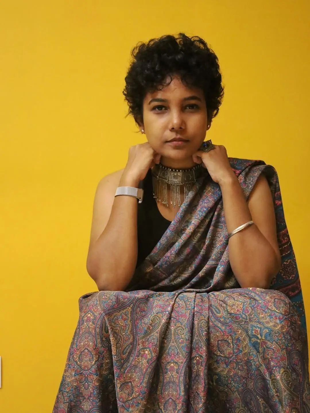 A picture of filmmaker Malini Jeevarathnam, one of the queer filmmakers in India making waves in the queer representation in Indian cinema via queer film festivals India and queer cinema India