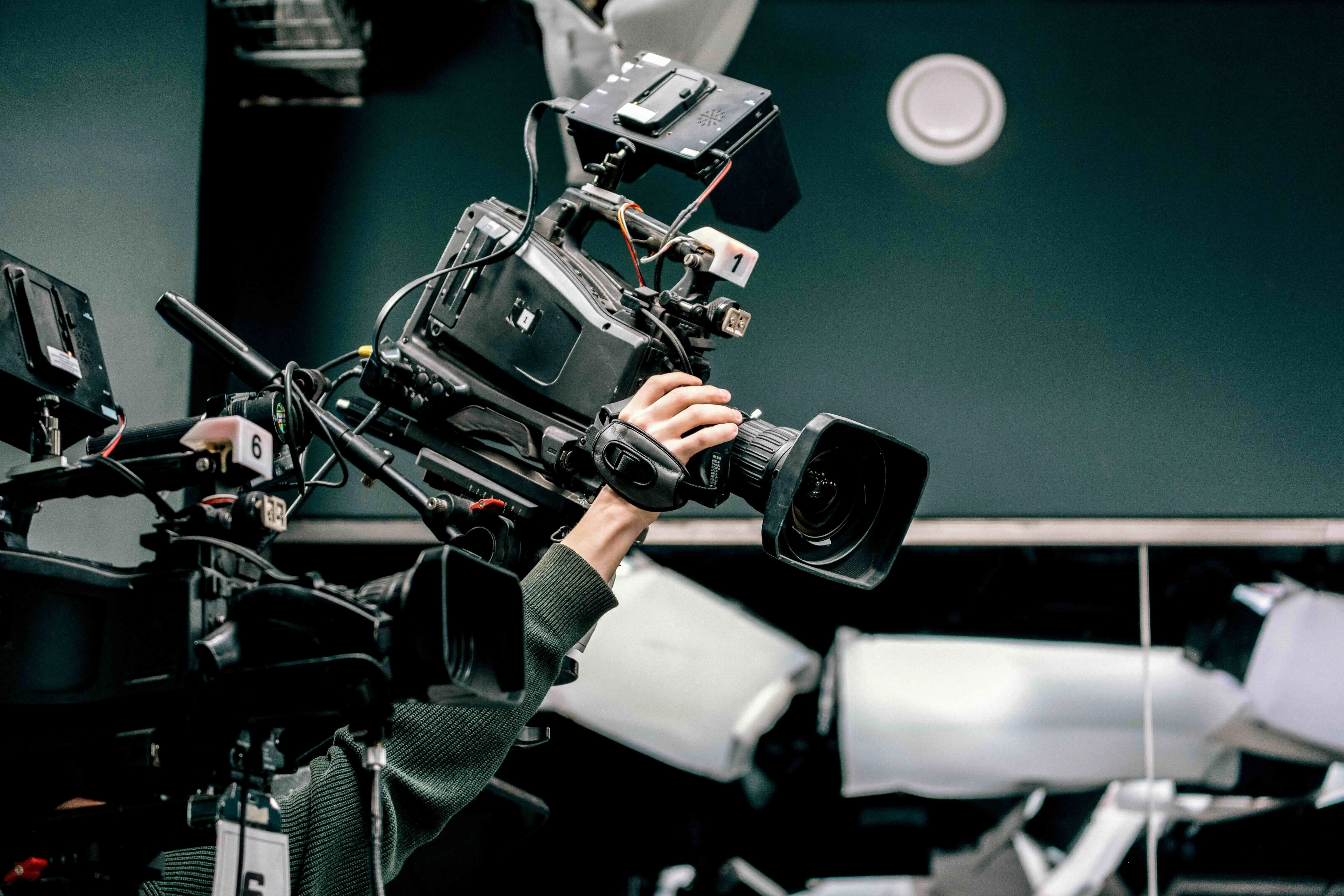 A picture of people shooting with cameras to depict how queer filmmakers in India, LGBTQ filmmakers India, trans filmmakers India, queer film festivals India and queer producers India, are contributing towards queer cinema India and queer representation in Indian cinema