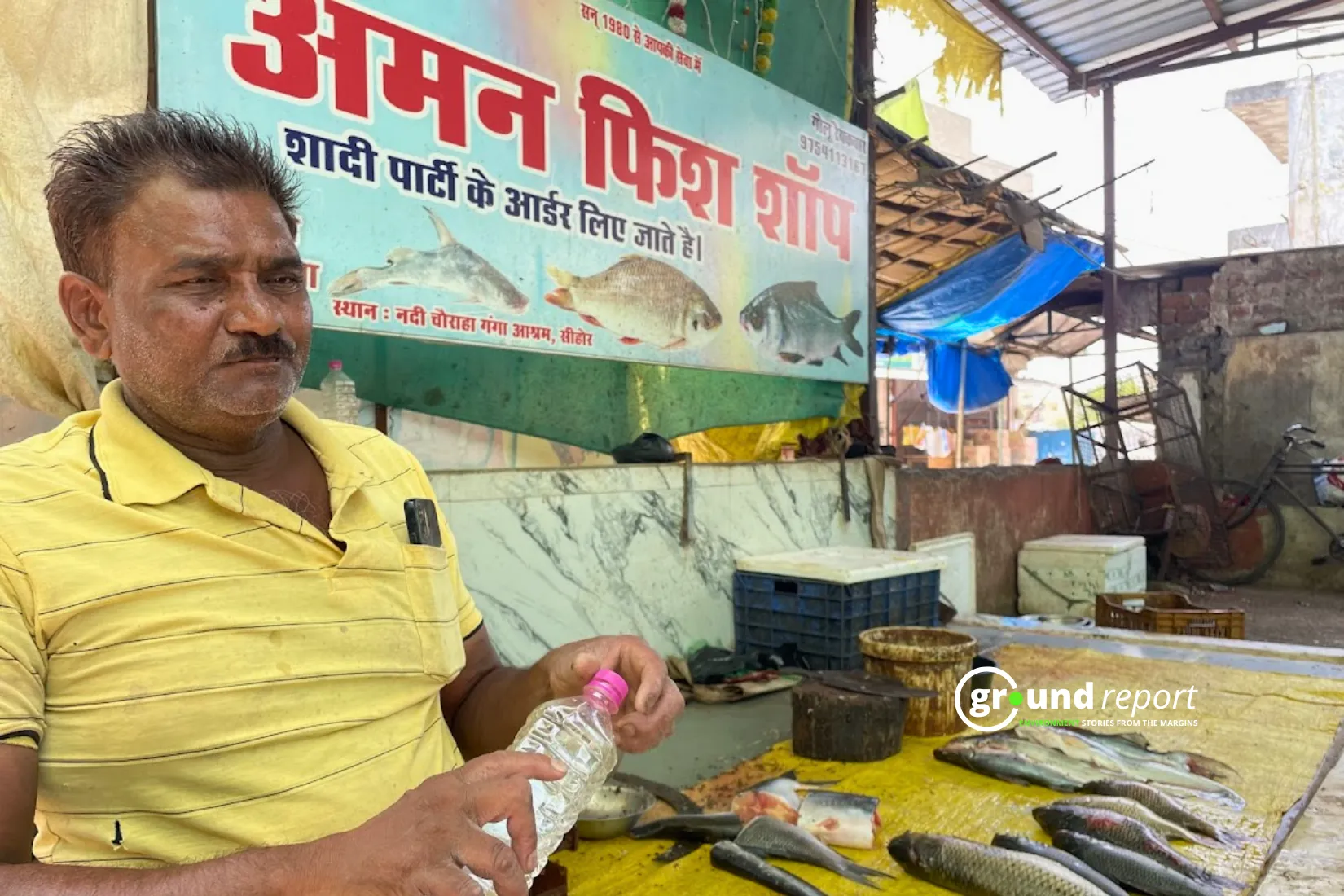 Anil Raikwar selling fish at Sehore fish market