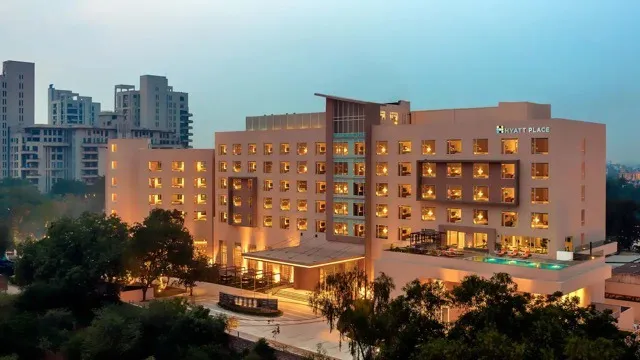 Hyatt-Place-Gurgaon-Udyog-Vihar-P002-Hotel-Exterior-Night.16x9 (1)