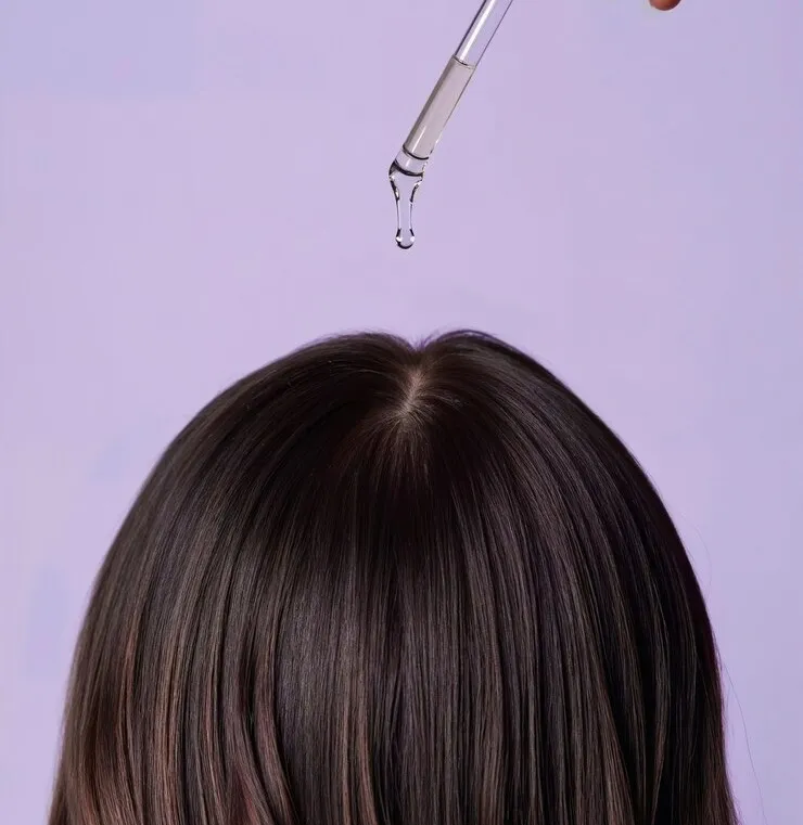 Homemade Herbal Hair Care Oil With Hibiscus And Leaves 1