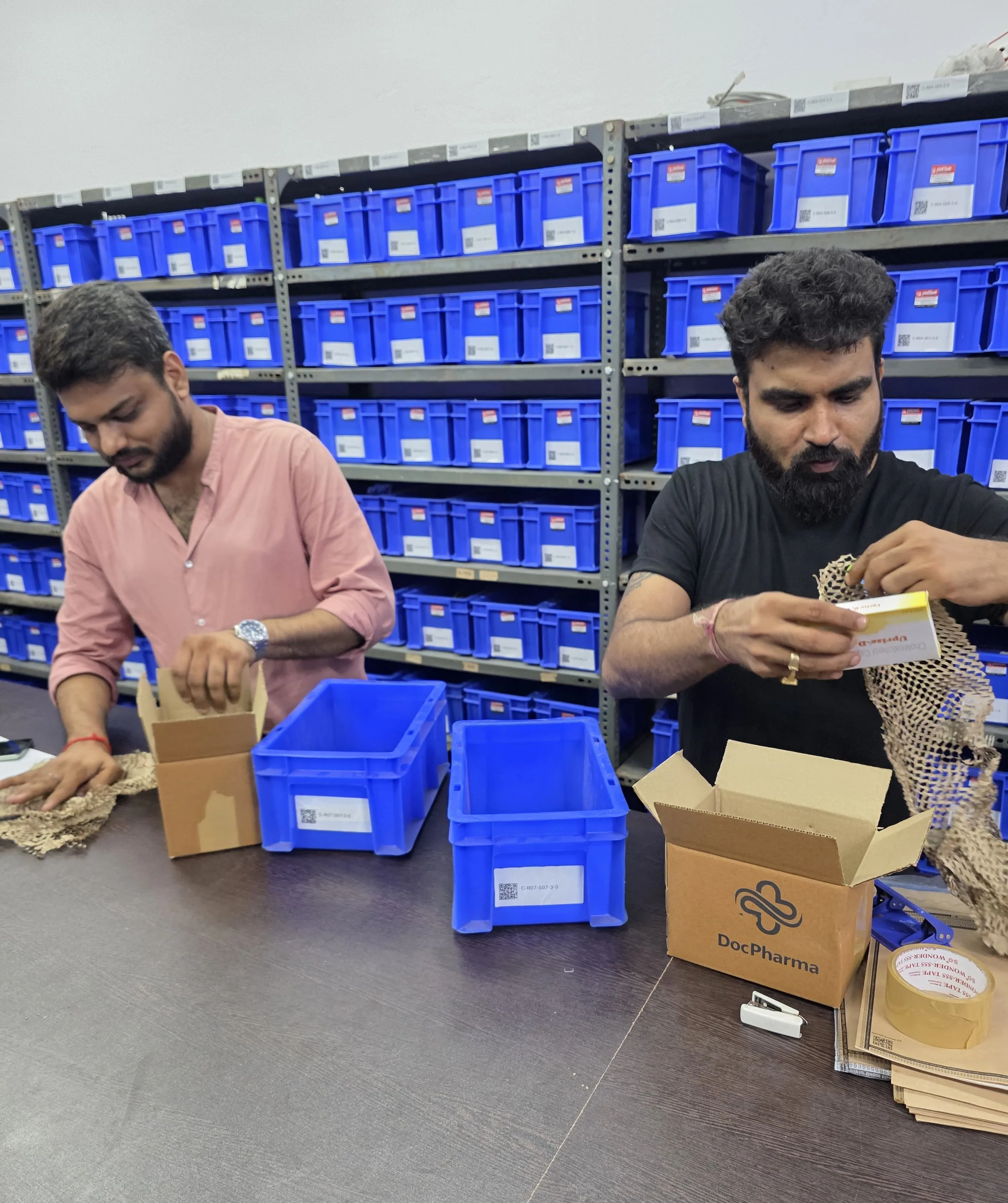 DocPharma two team members preparing boxes