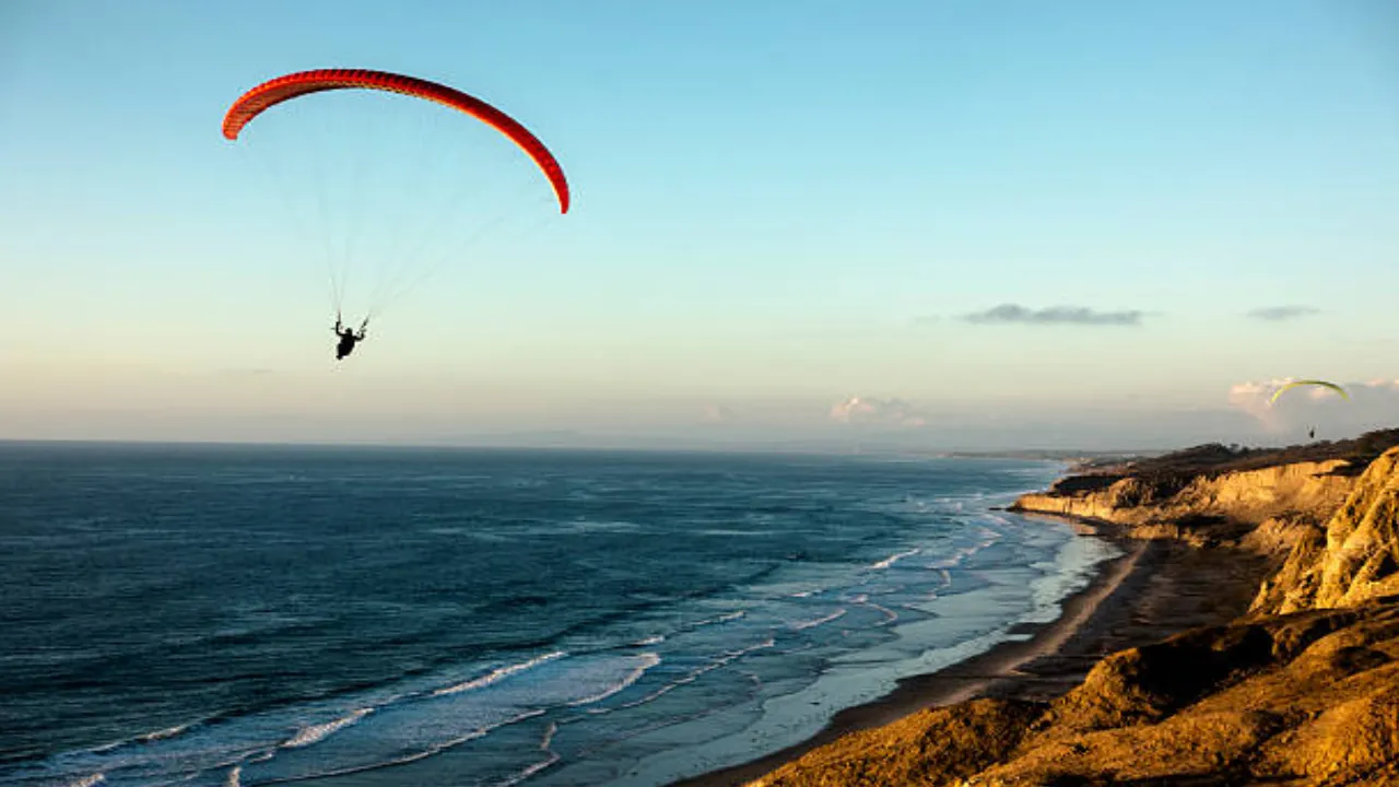 Paragliding and Surfing at Kondivali Beach