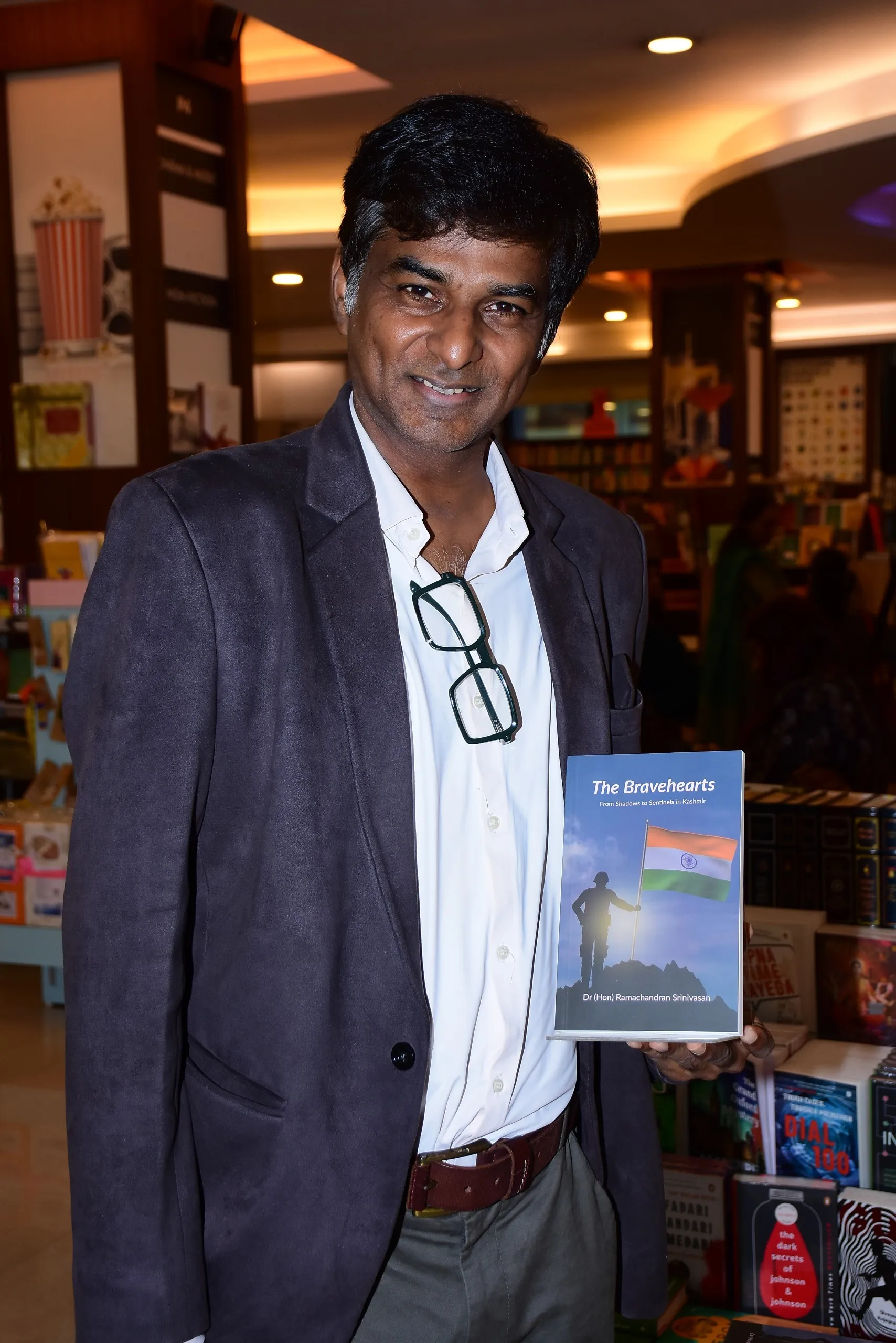Raveena Tandon releases the book The Bravehearts by author Ramachandran Srinivasan (3)