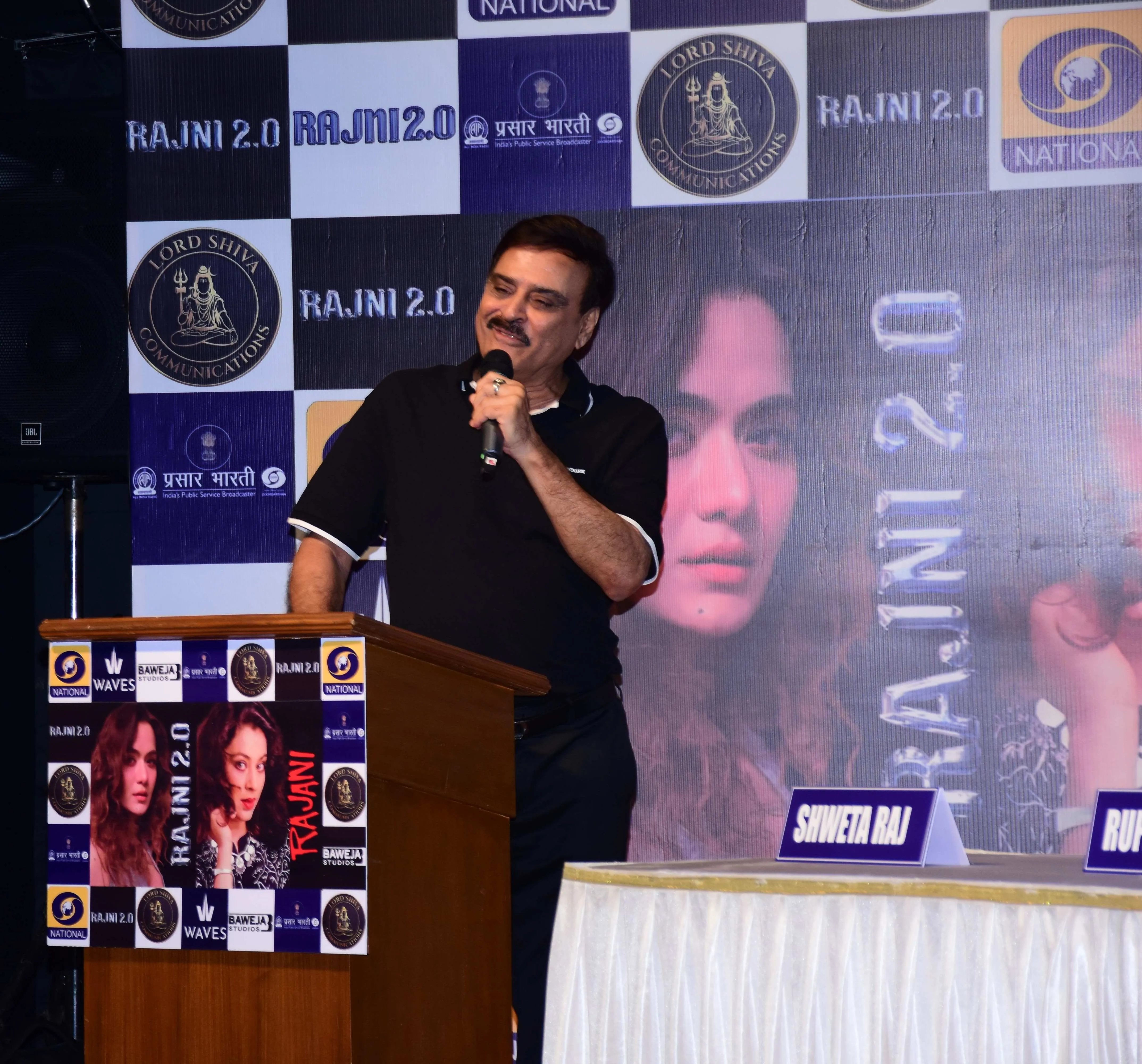 Karan Razdan addresses the media at the Rajni 2.0 press conference.