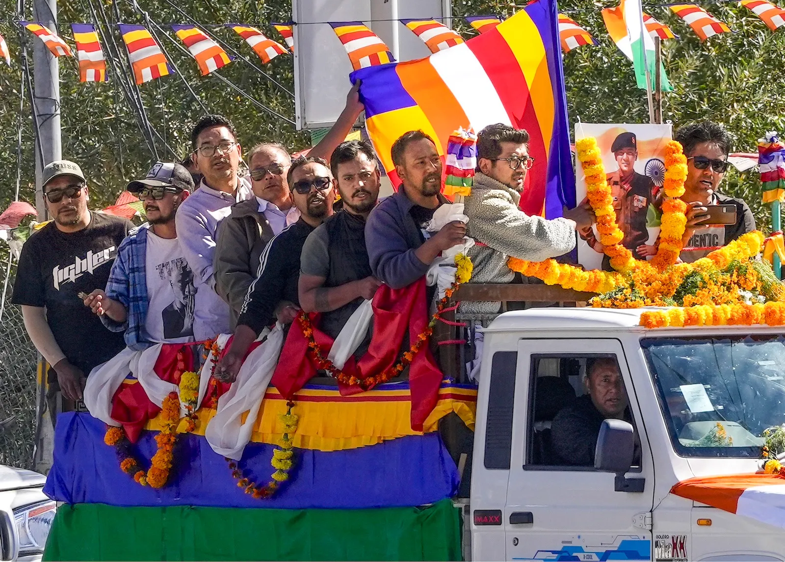 Mortal remains of 46-year-old ex-serviceman Tsewang Tharchin, a Kargil War veteran, who was killed in violence during recent protests for Ladakh statehood, being taken for his last rites amid curfew, in Leh, Monday, Sept. 29, 2025.