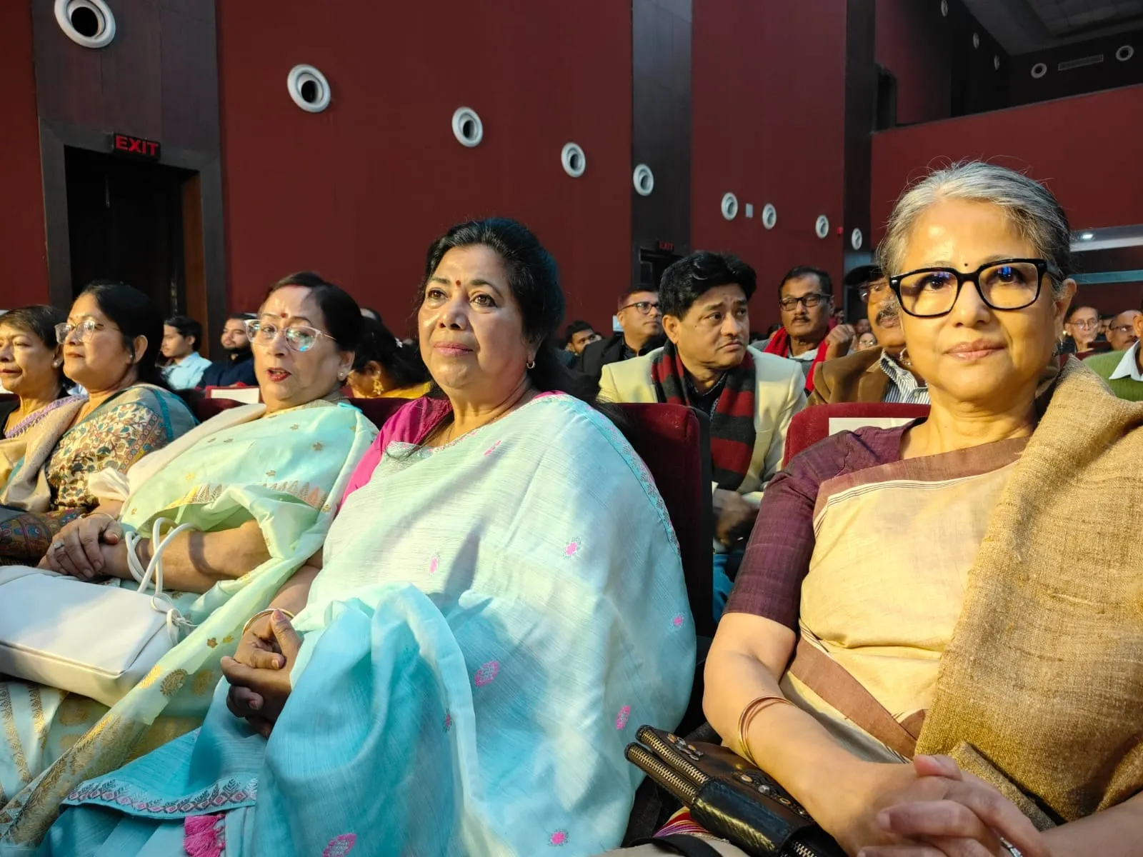 Guests taking seat at the auditorium