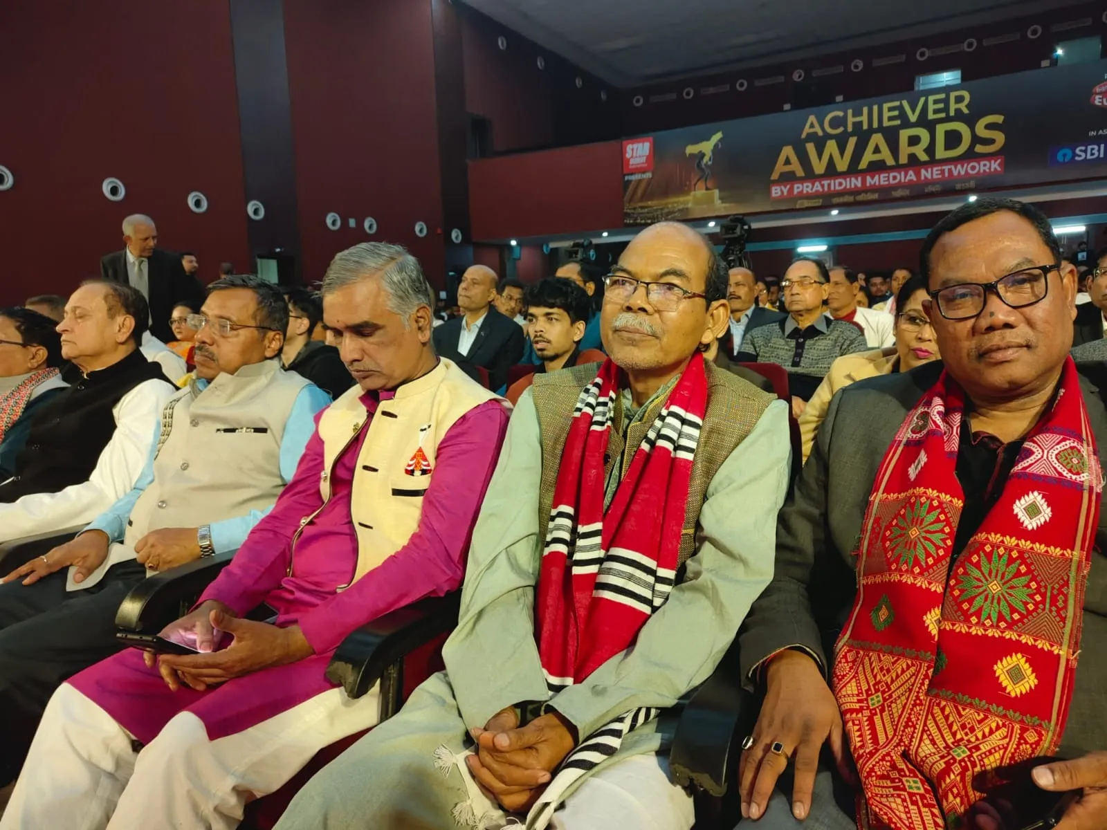 Guests taking seat at the auditorium2