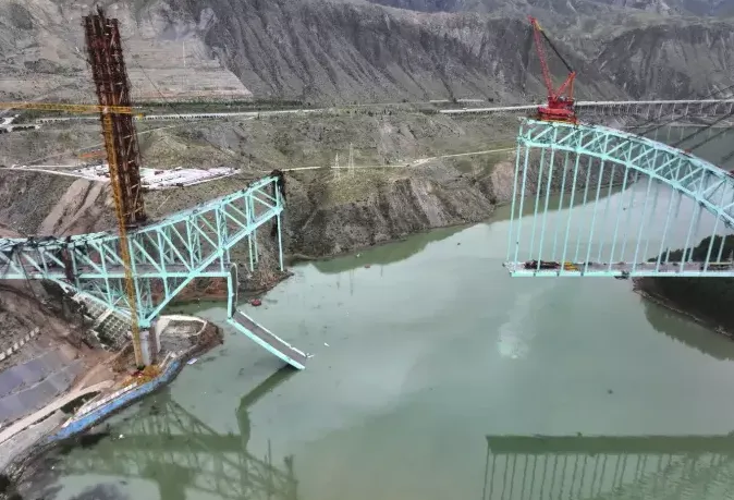 Under-construction bridge collapses