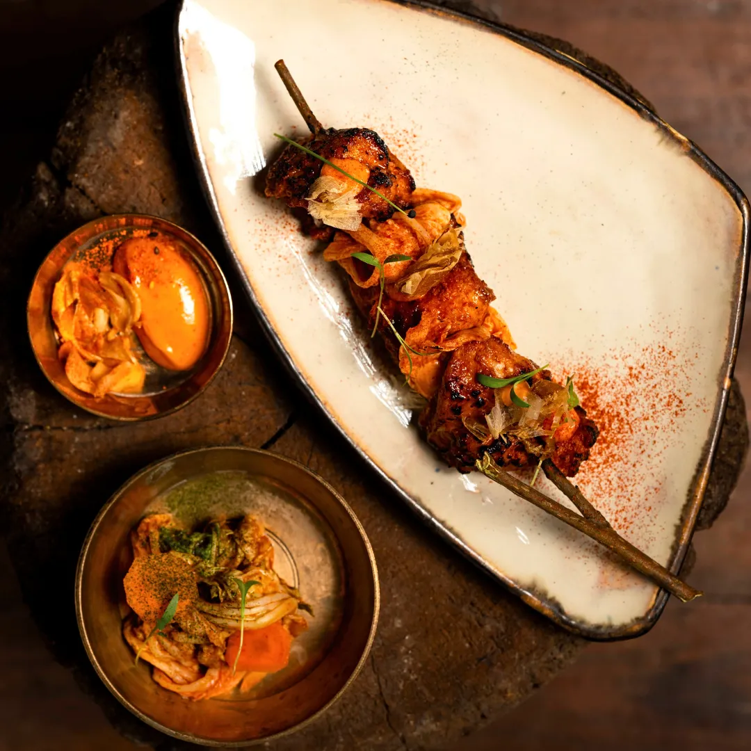 Patiala Peg-Dressed Flambeed Chicken with Bhangjeera Chutney