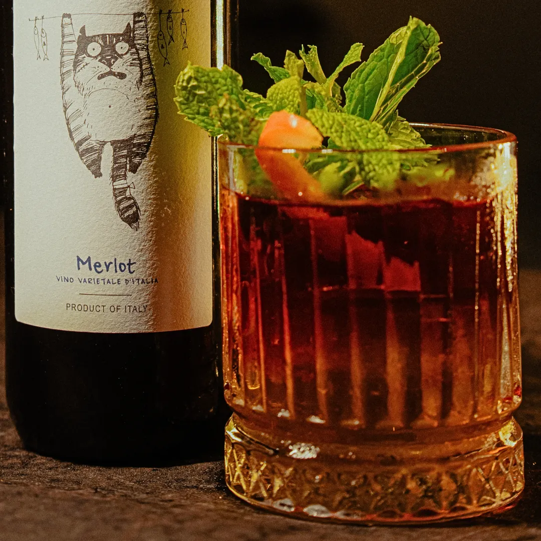Merlot’s Spicy Sunset Luxurious Dance of Italian Merlot, Indian Gin & Bell Pepper Warmth