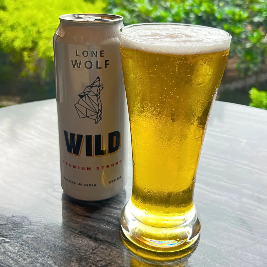 The Bold Lone Wolf A fearless fusion of peach-kissed gin, coastal Malibu & Lone Wolf