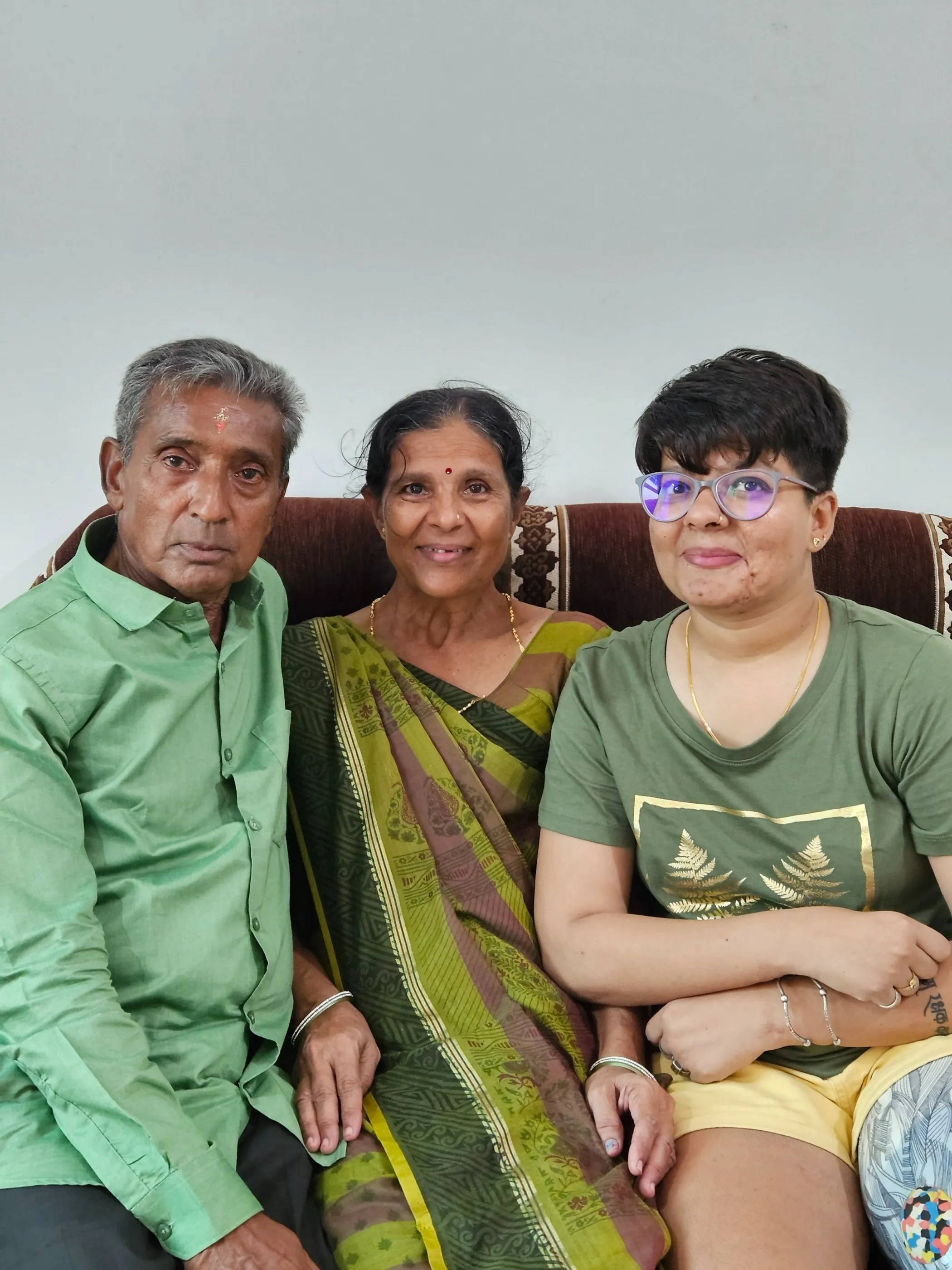 Neha with her mom and dad