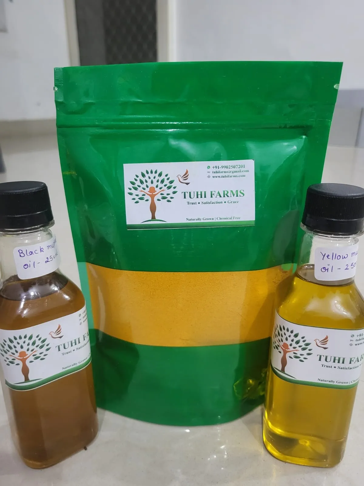 Processed organic products (mustard oil and besan) by Tuhi Farms