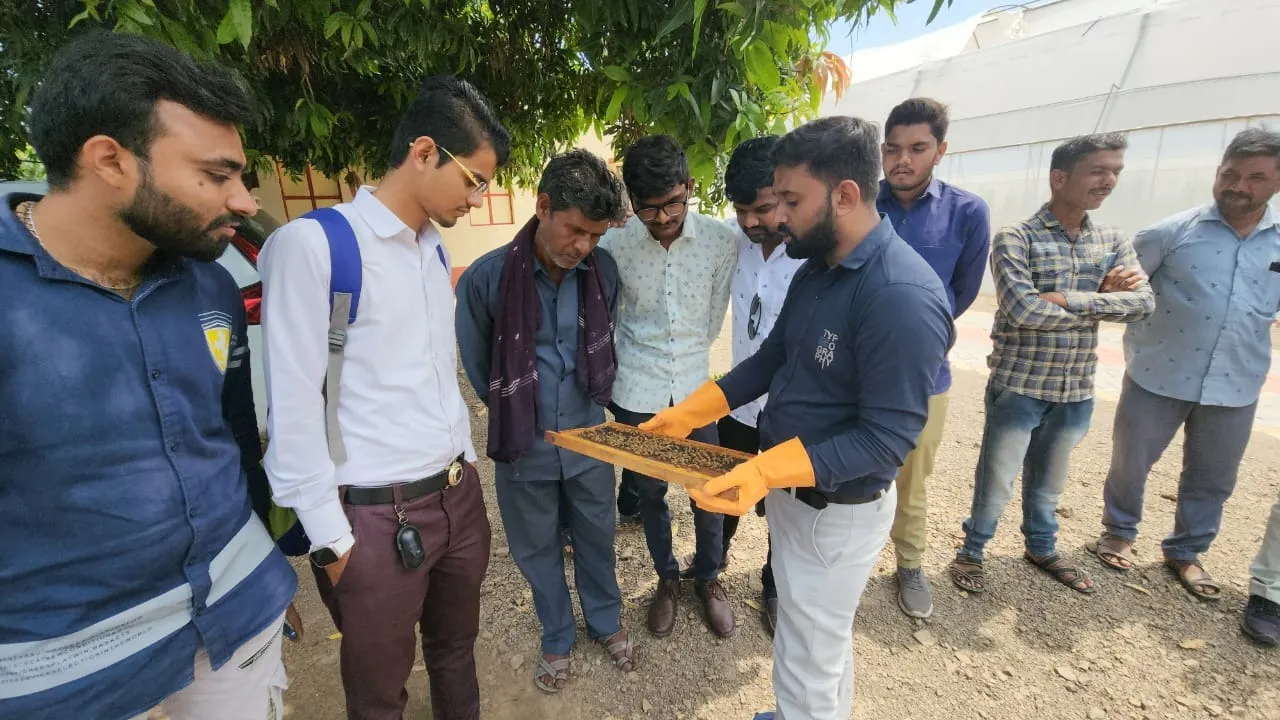 Amar Kalariya elaborates on beekeeping to other farmers