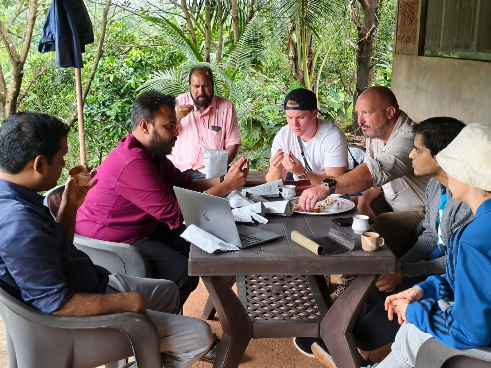 Mithilesh Desai and his father Harish Chandra Desai with their clients at farm
