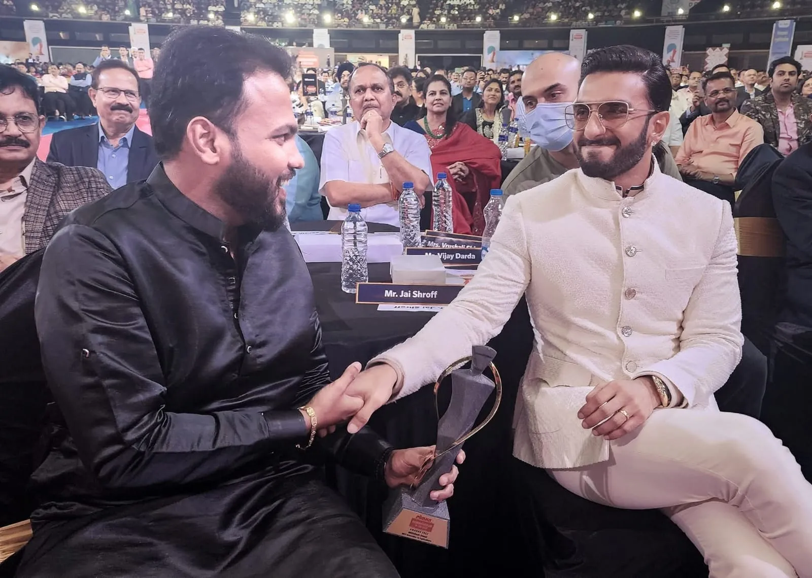 Mithilesh Desai with Bollywood actor Ranveer Singh at an award function