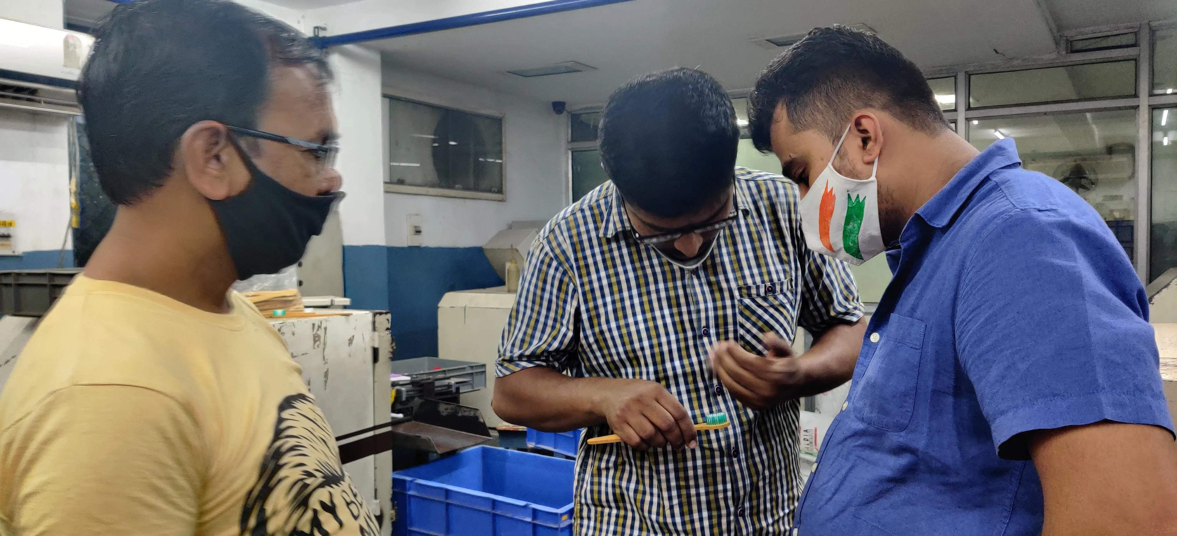 A quality analysis of a bamboo toothbrush being conducted at Bamboo India