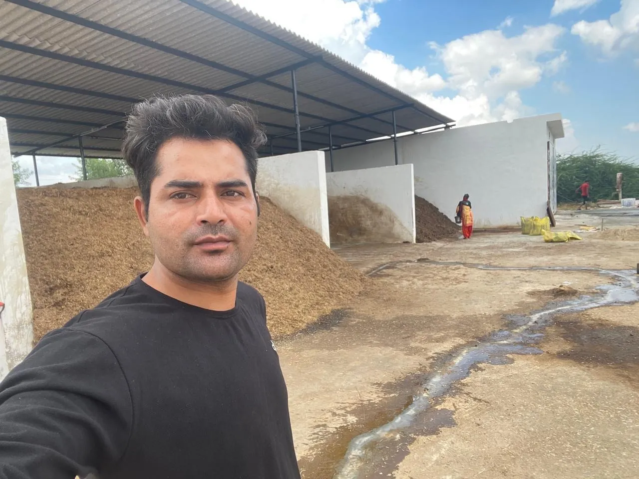 Shankar is overseeing the preparation of nutrient-rich compost substrate the essential foundation for a successful mushroom harvest