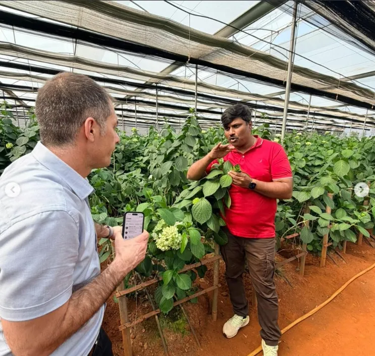 Bollapally Srikanth explains farm operations to Israeli dignitary