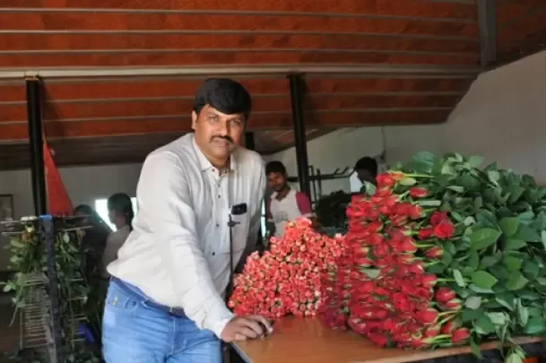 Bollapally Srikanth with a bunch of flowers