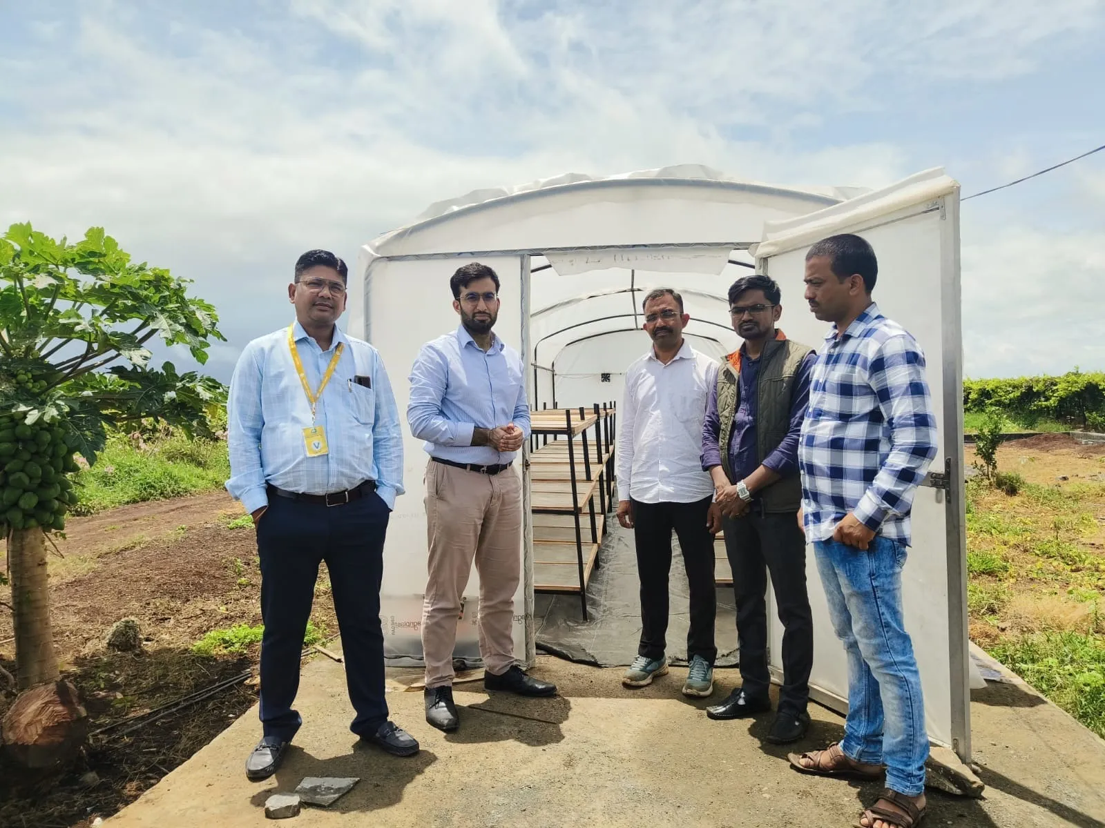Varun Raheja demonstrating the effectiveness of solar dryers