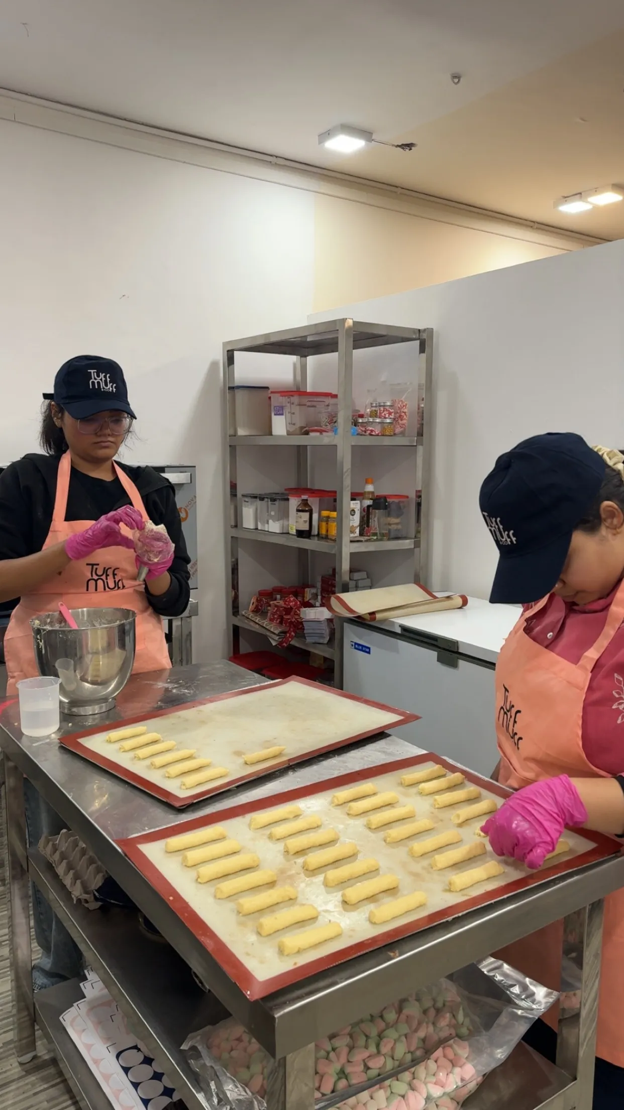 A glimpse of Tuff Muff and Co team preparing desserts