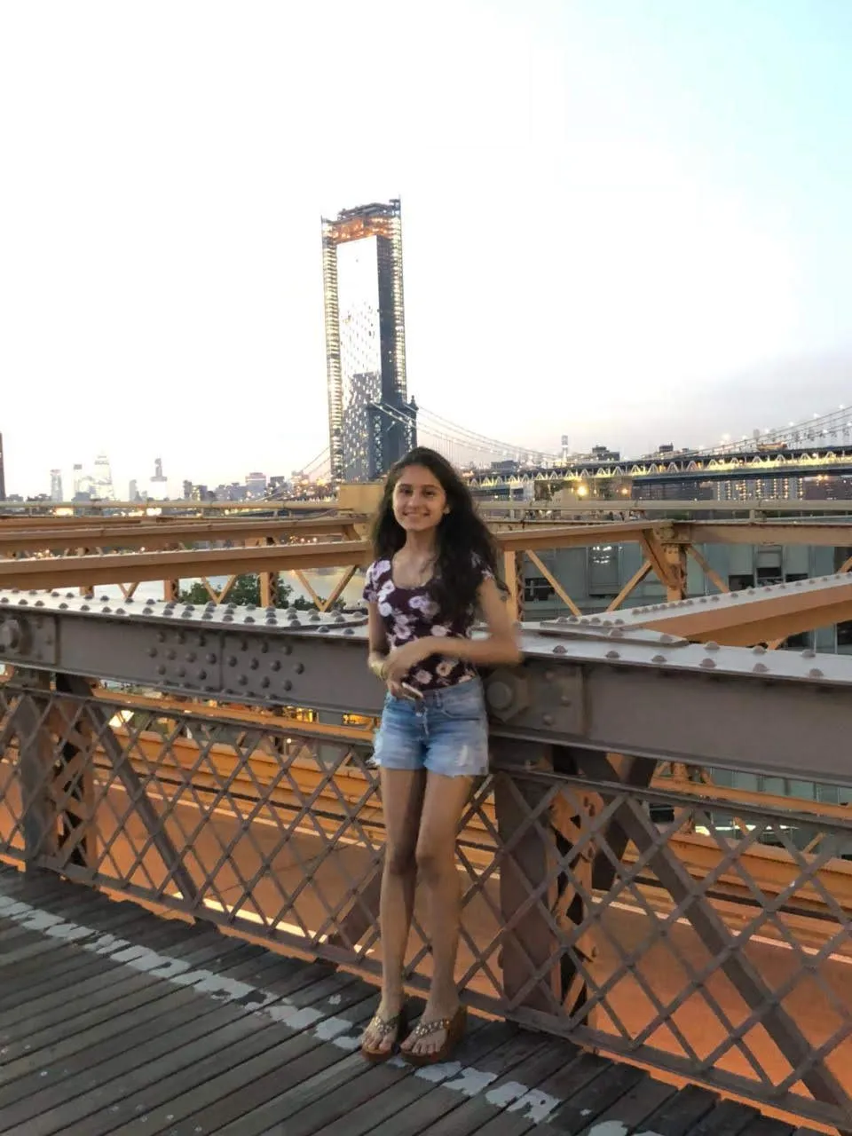Ridhima taking in the sunset views from the New York's Brooklyn Bridge