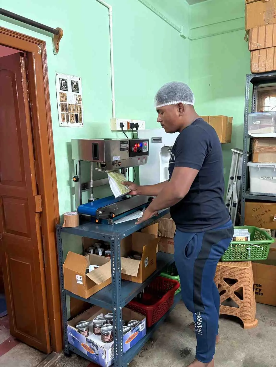 A glimpse into the careful sealing process at Earth Story Farms facility