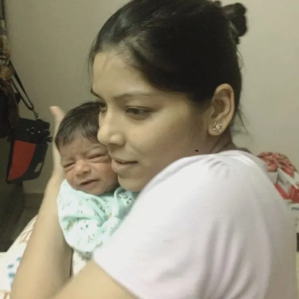 Sapna Jain along with her baby