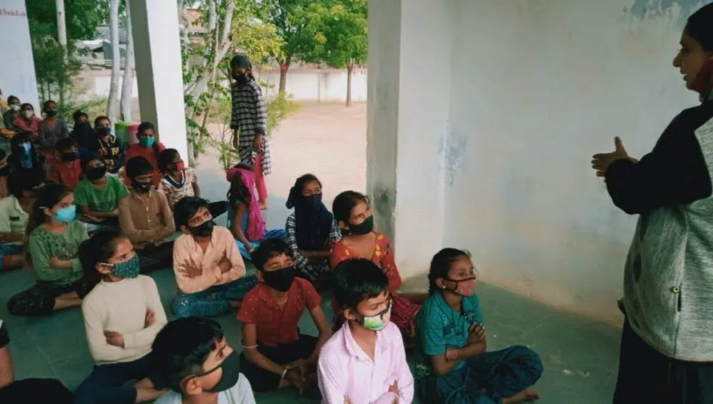 Ranjanben Guiding Salt Workers Children