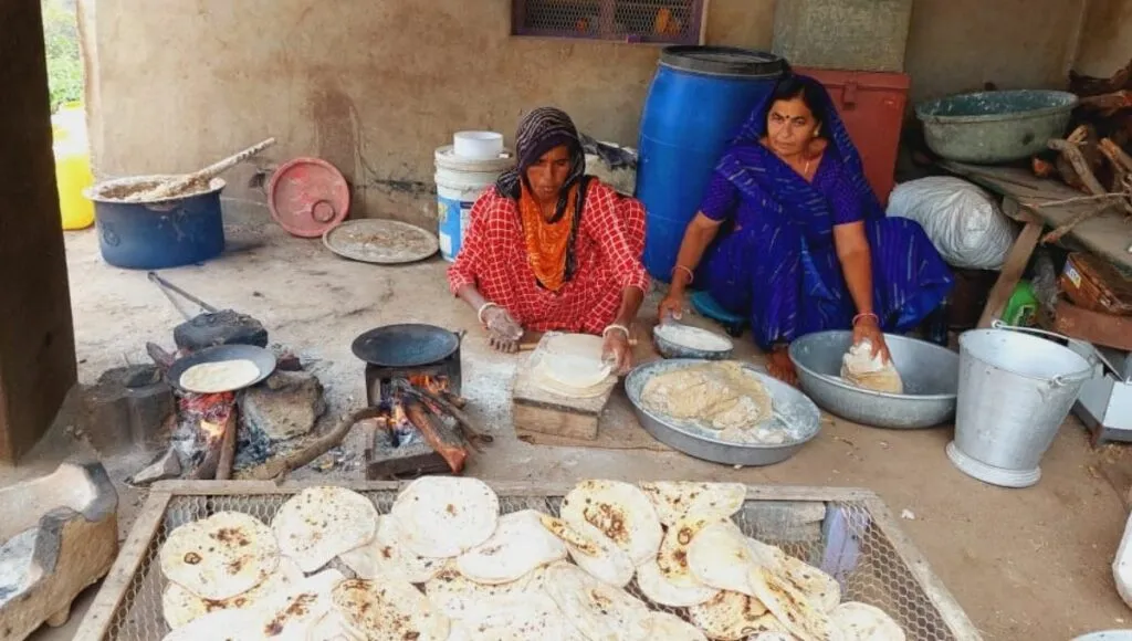 charan family making chapatis for Feeding Stray Animals