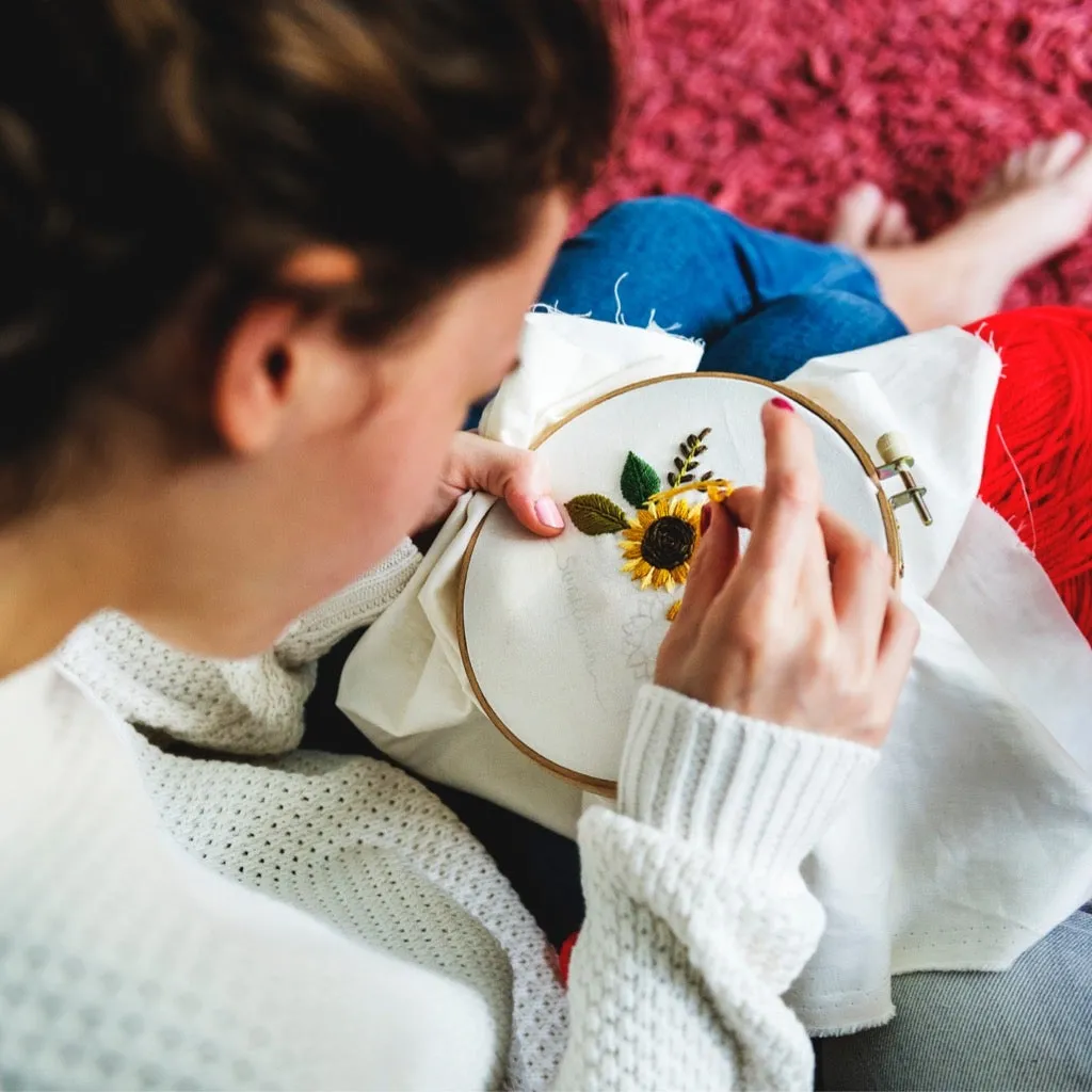 Young girl doing hand embroidery