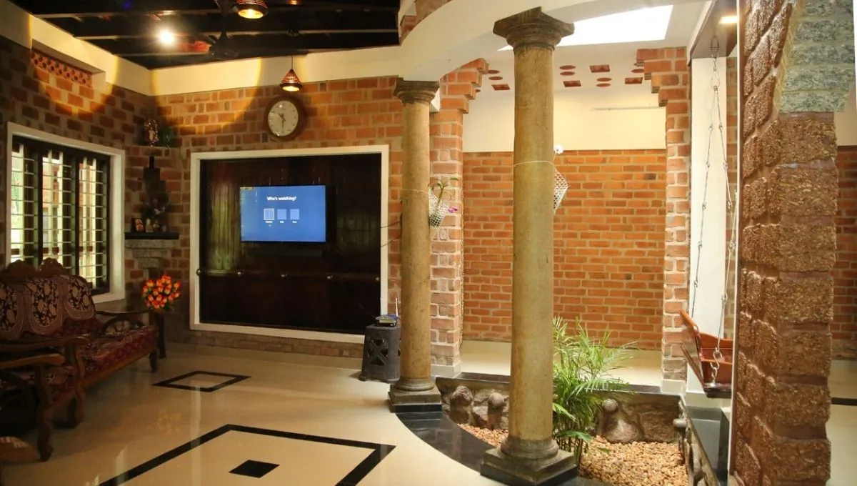 Used Laterite Stones, Country Bricks and Recycled Wood to build house 