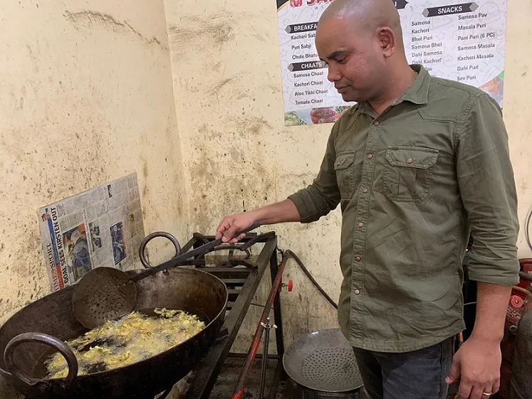 Kumar Abhishek from Sai Chat Centre frying pakoras