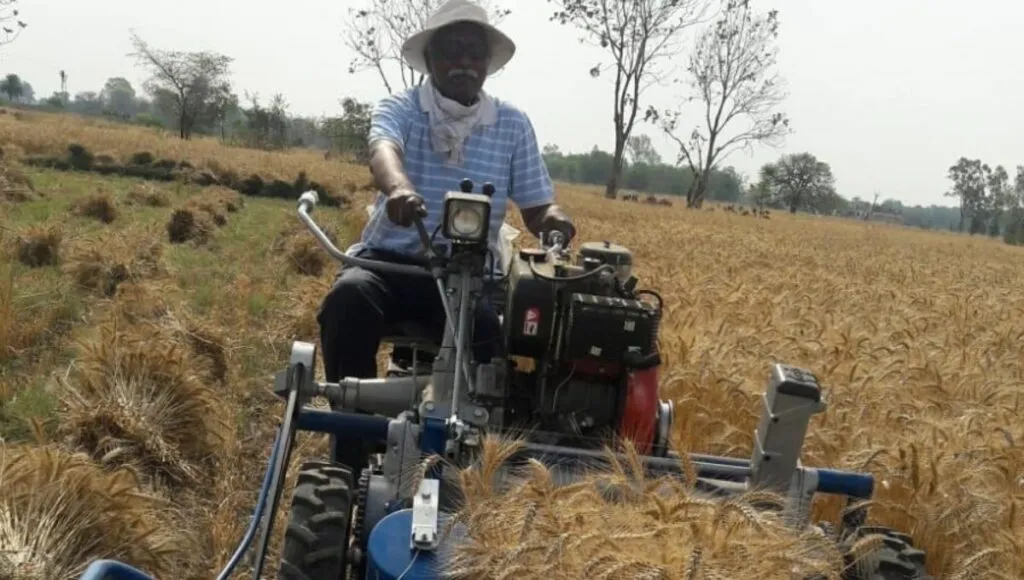 Farming Techniques : Dr. jai Narayan Tiwari, using Threshing Machine
