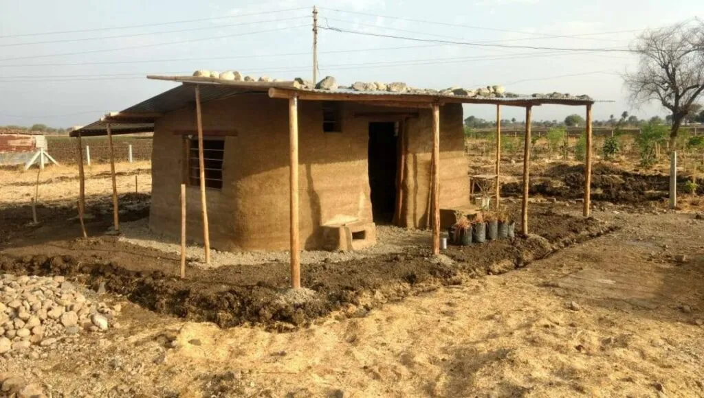 their mud house in farm 